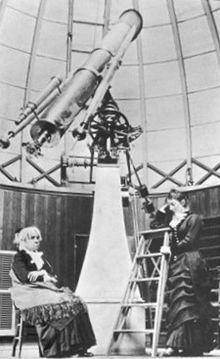Maria Mitchell seated inside the Vassar College Observatory.